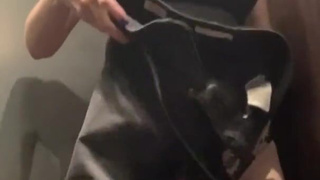 Hot MILF masturbates in the fitting room of the store